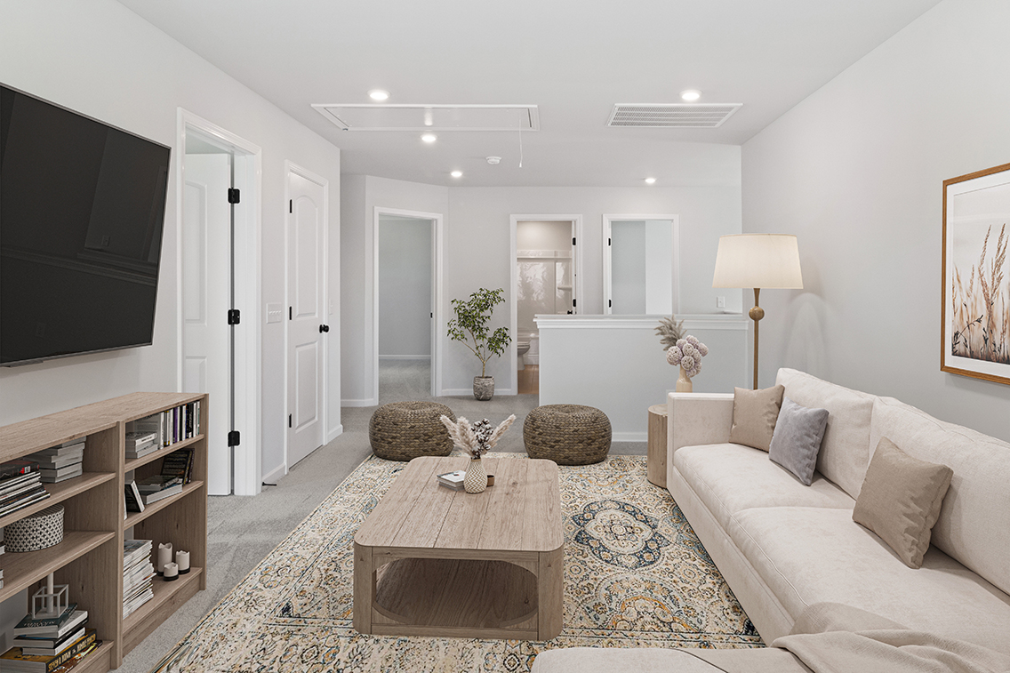 A living room with a large mirror.