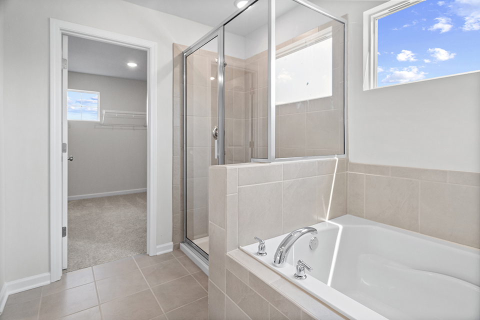 A bathroom with a glass shower.