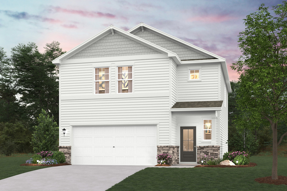 A white house with a garage.