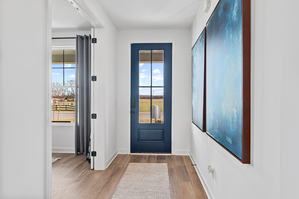 A room with a door and a window.