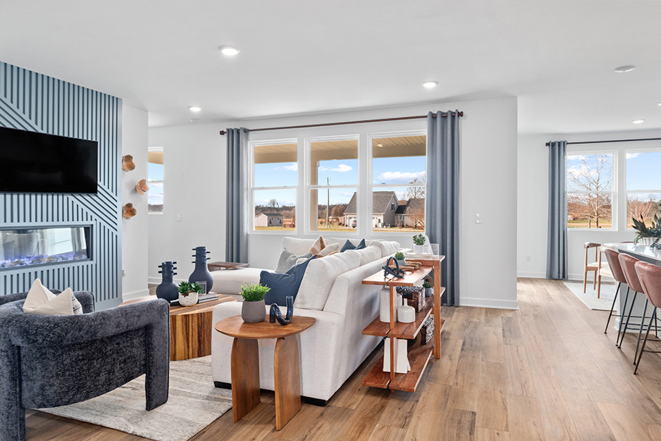 A living room with a large window.
