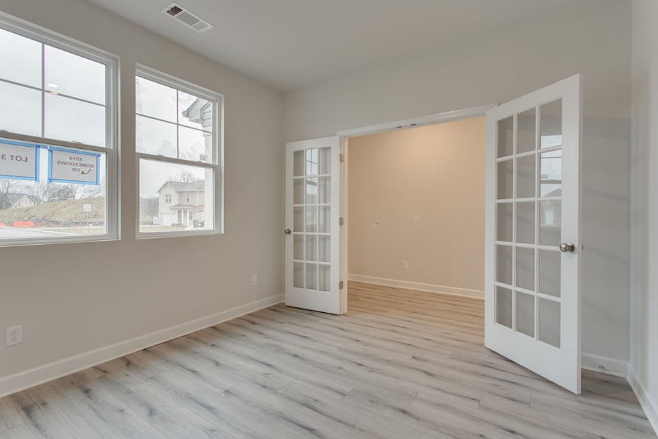 A room with white doors.