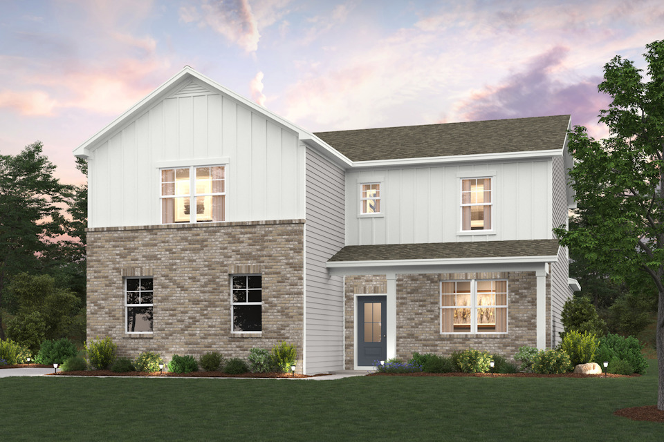 A grey house with a lawn.