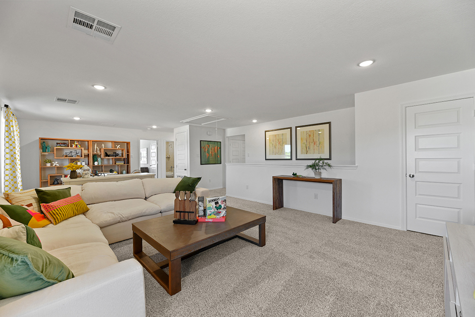 A living room with a couch and a coffee table.
