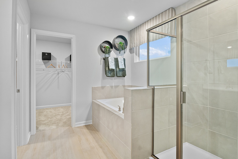 A bathroom with a glass shower.