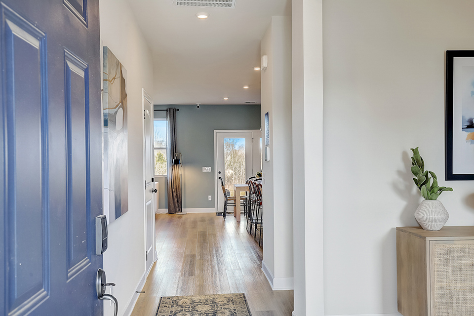 A hallway with blue doors.