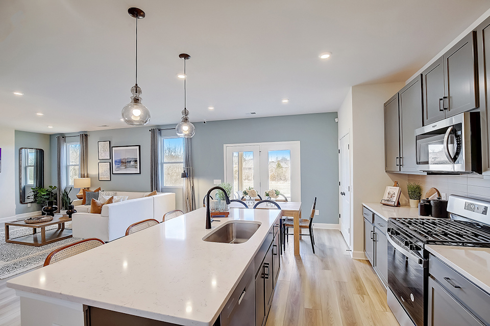 A kitchen with a large island.