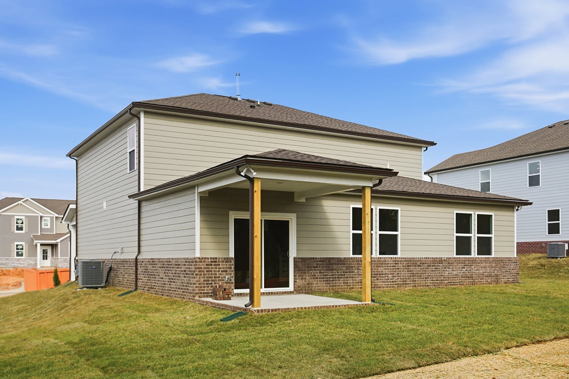 A house with a brick wall.