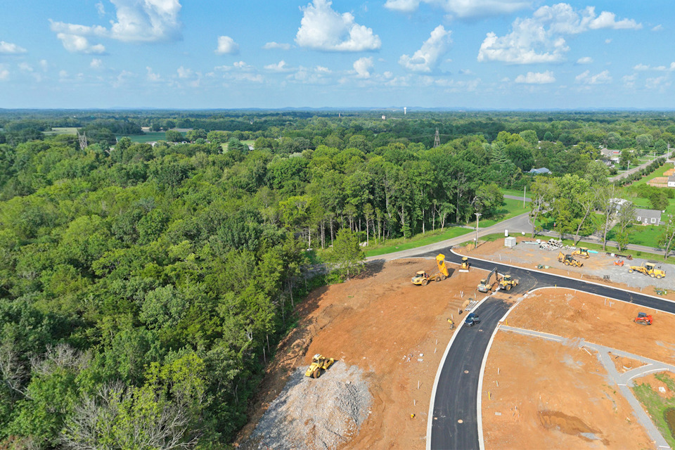 A road with trees on the side.