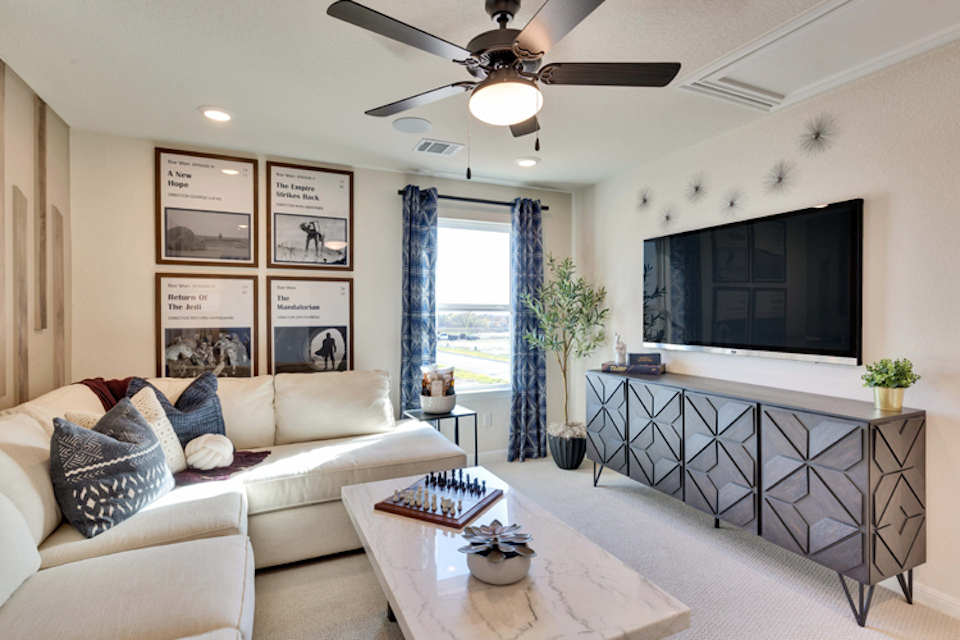 A living room with a large window.