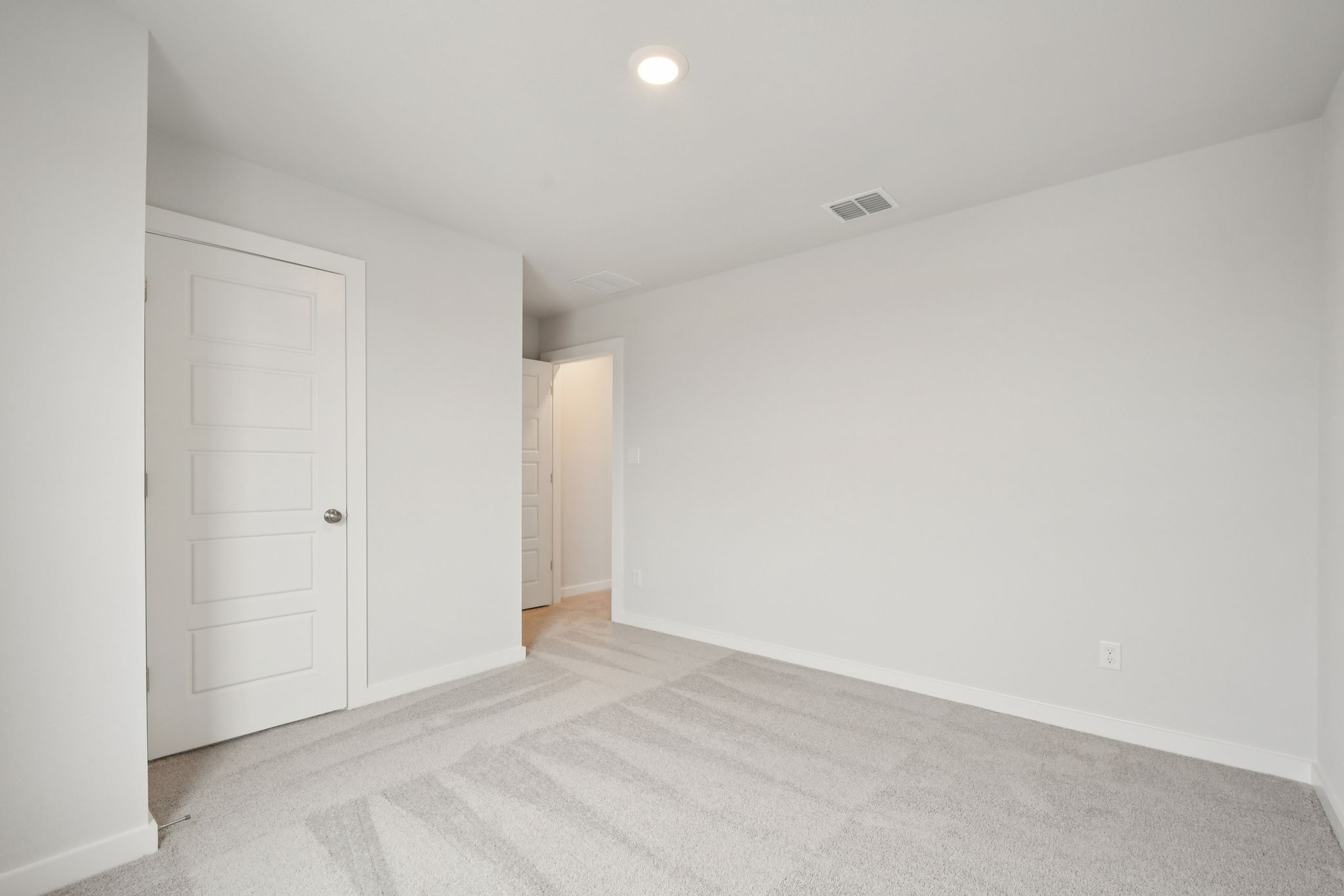 A room with white doors.