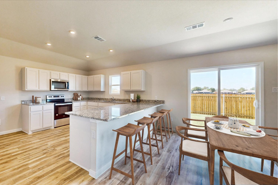 A kitchen with a large island.