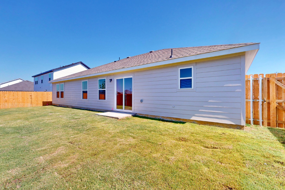 A house with a fence around it.