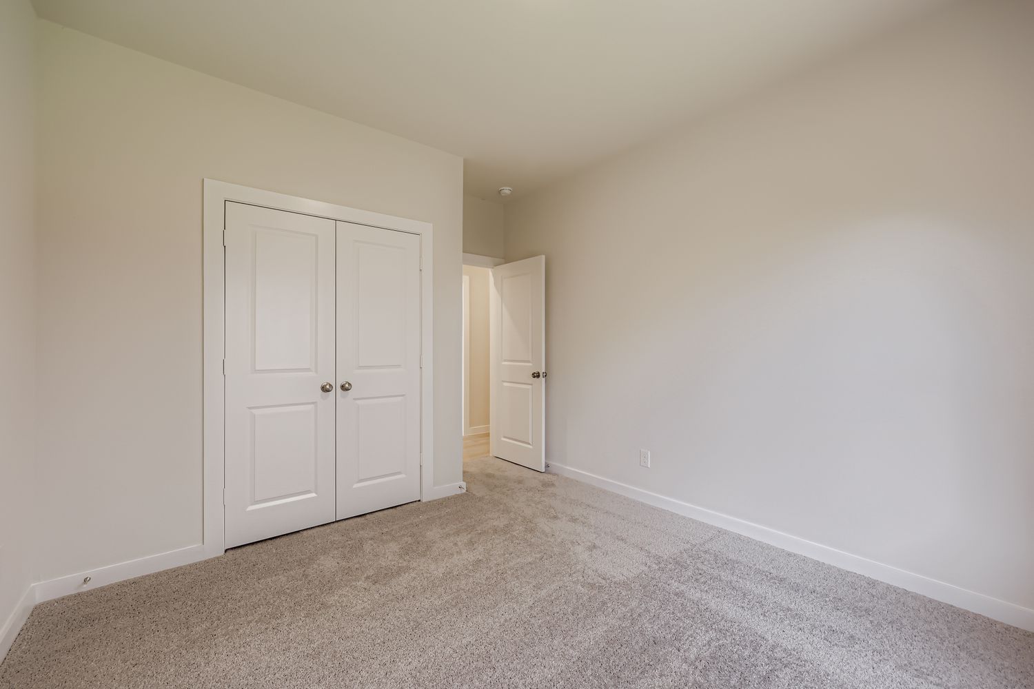 A room with white doors.