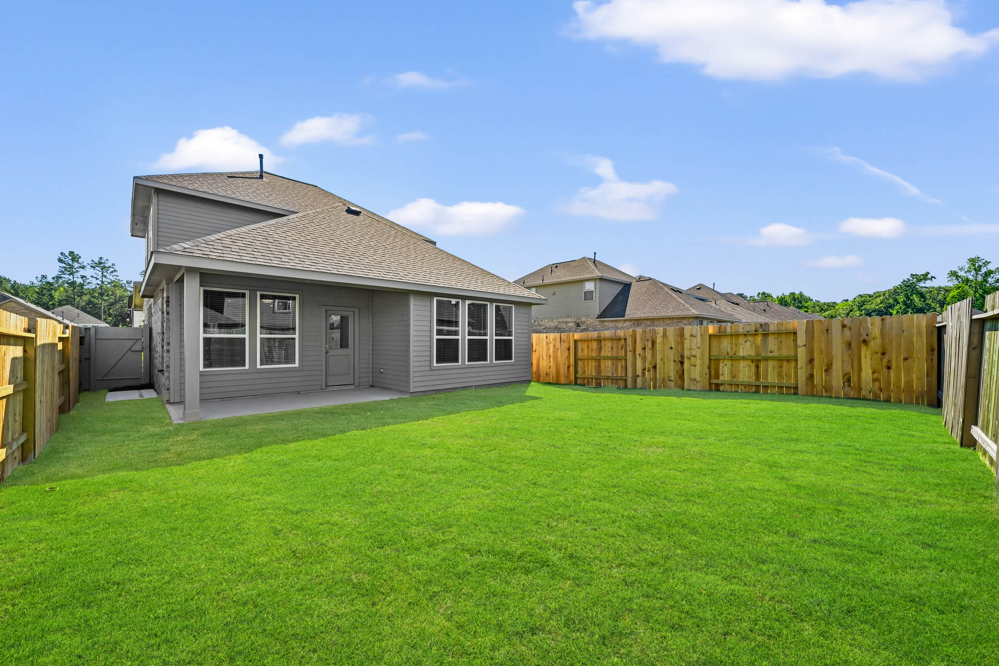 A house with a fence around it.