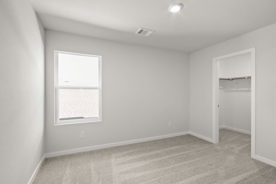 A room with a door and a window.