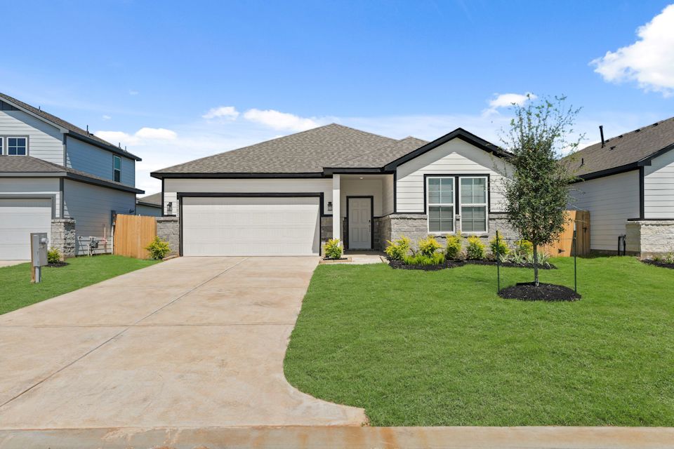 A house with a driveway.