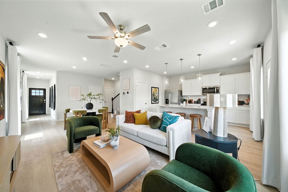 A living room with a fan.