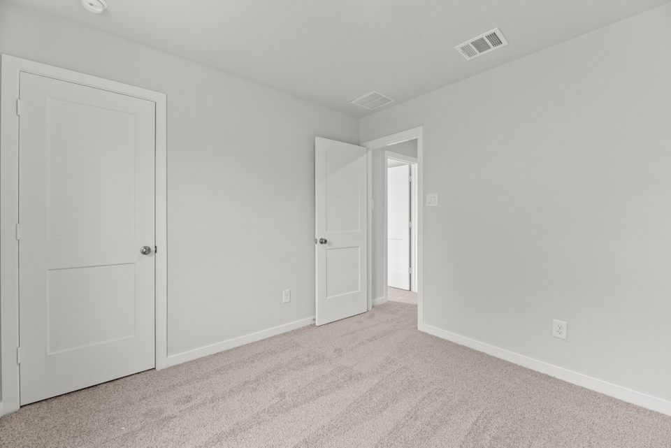 A room with white doors.