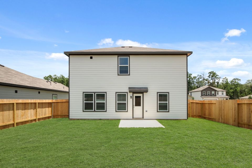 A house with a fence around it.