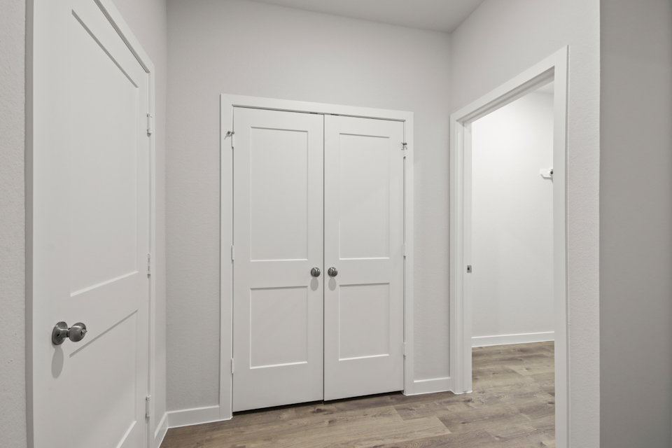 A room with white doors.