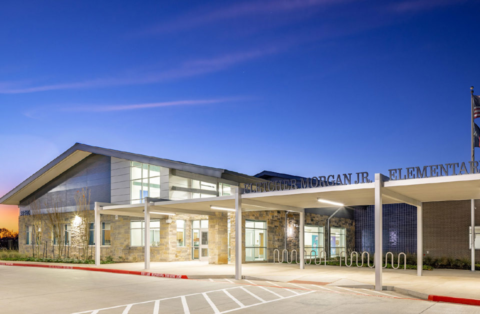 A building with a parking lot.