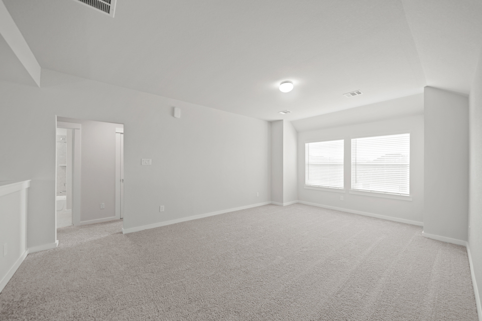 A room with a door and windows.