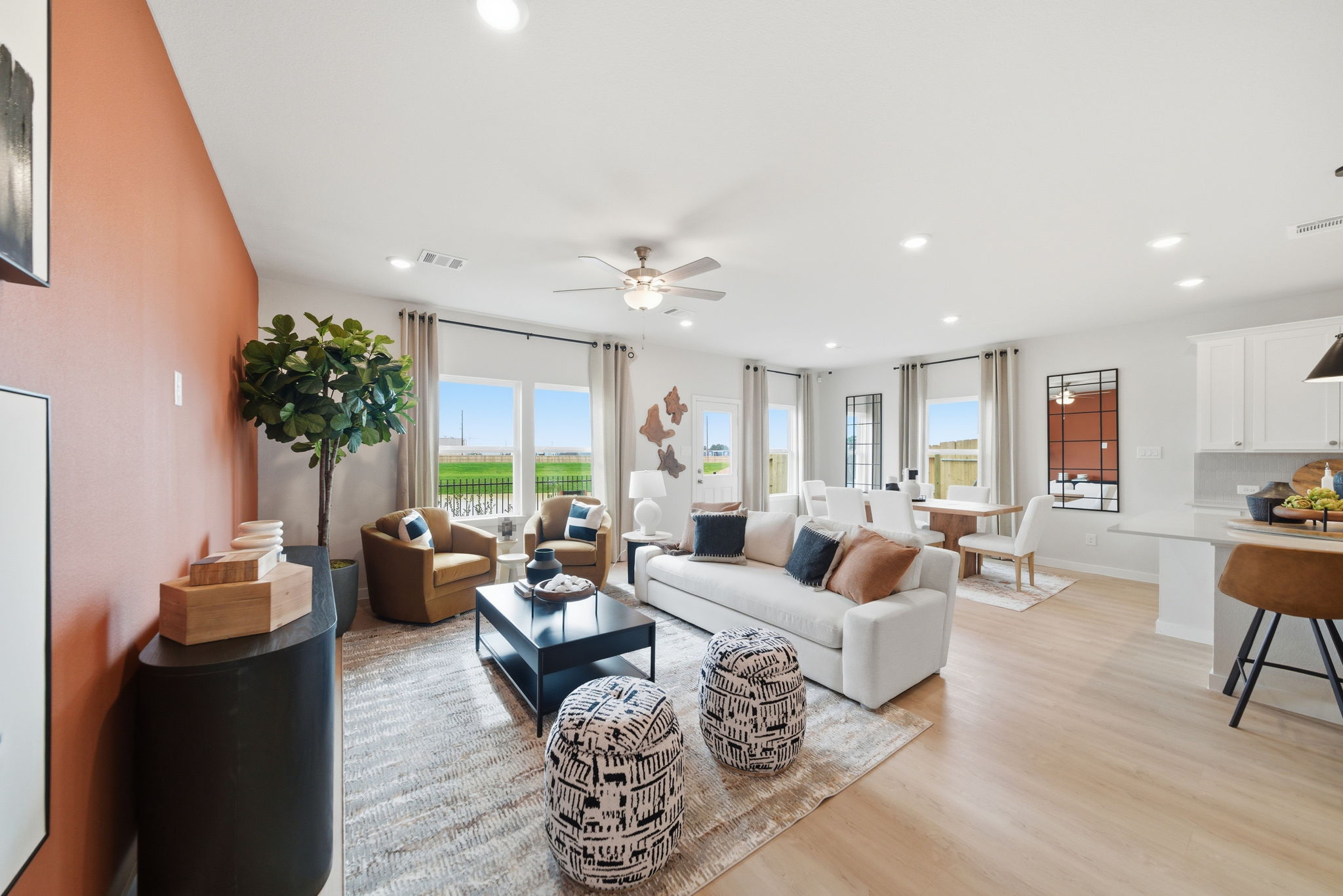 A living room with a large window.