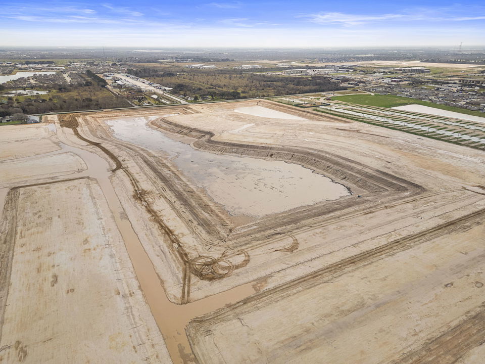 A large area of land with a river running through it.