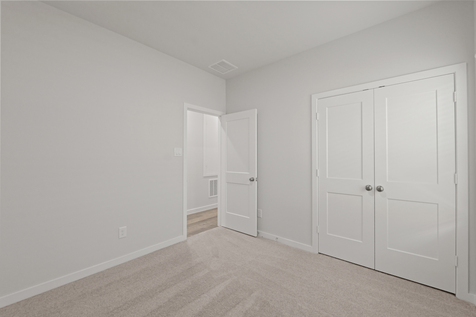 A room with white doors.