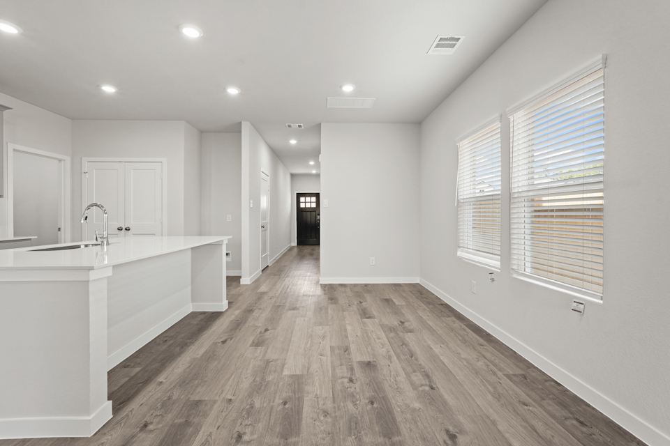 A bathroom with a wood floor.