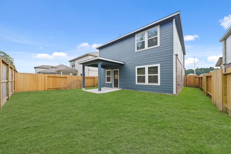 A house with a fence around it.