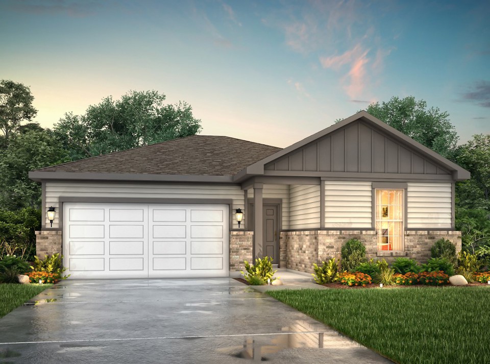 A house with garages and a driveway.