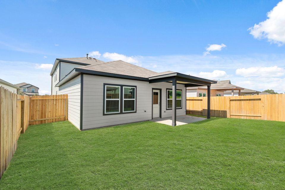 A house with a fence around it.