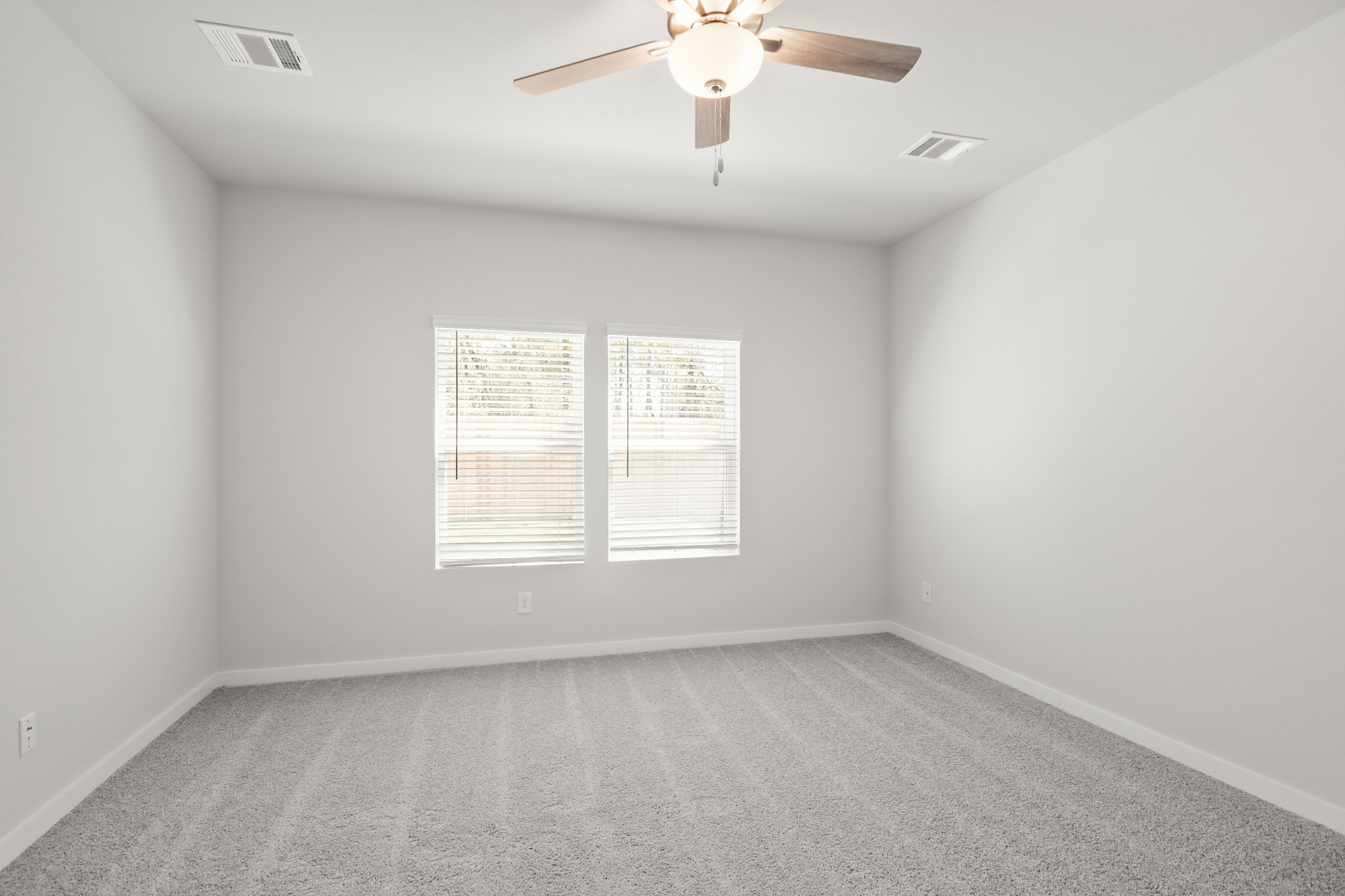 A ceiling fan in a room.