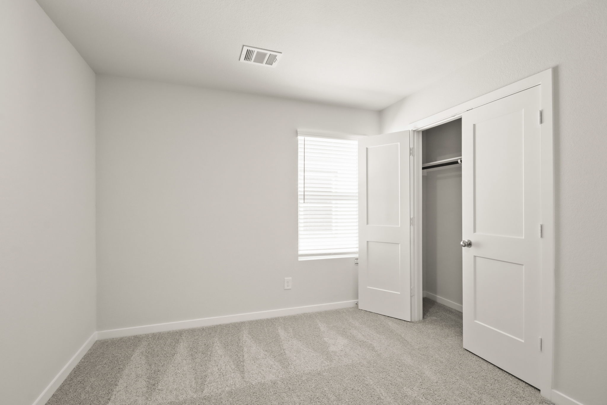 A room with white doors.