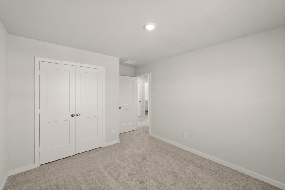 A room with white doors.