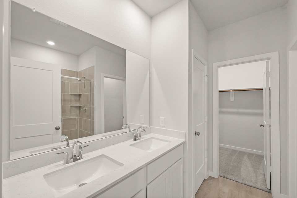 A bathroom with a glass shower.