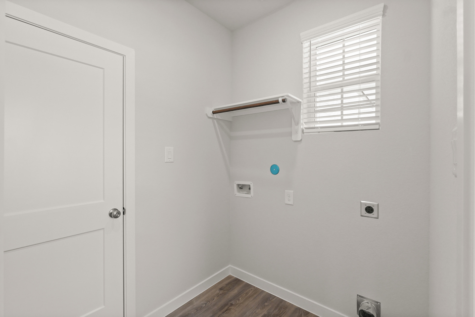 A white door with a window.