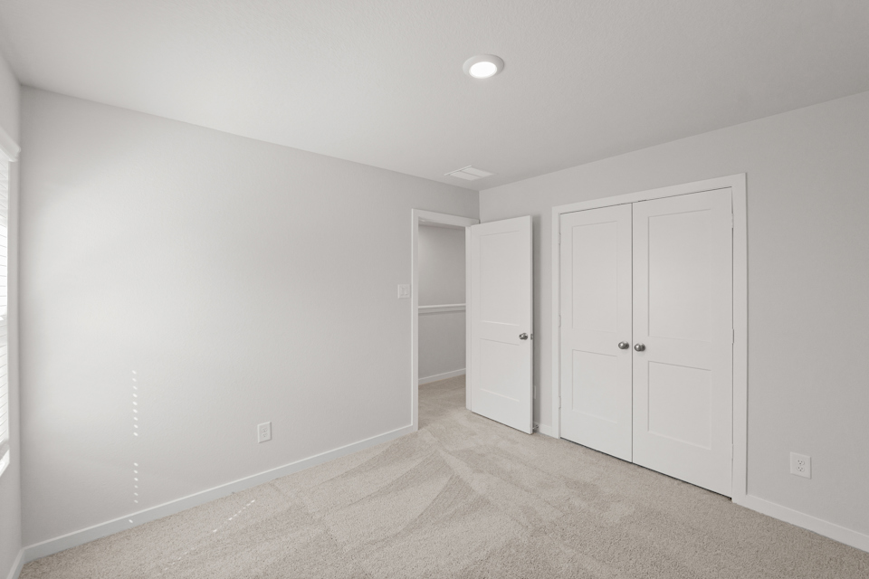 A room with white doors.