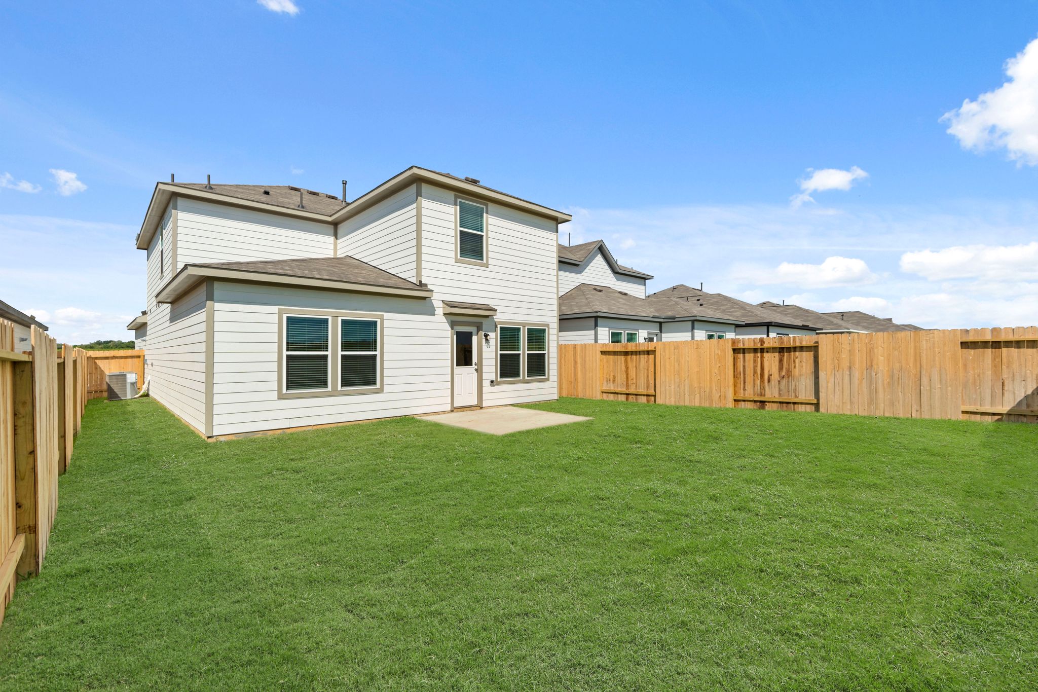 A house with a fence around it.