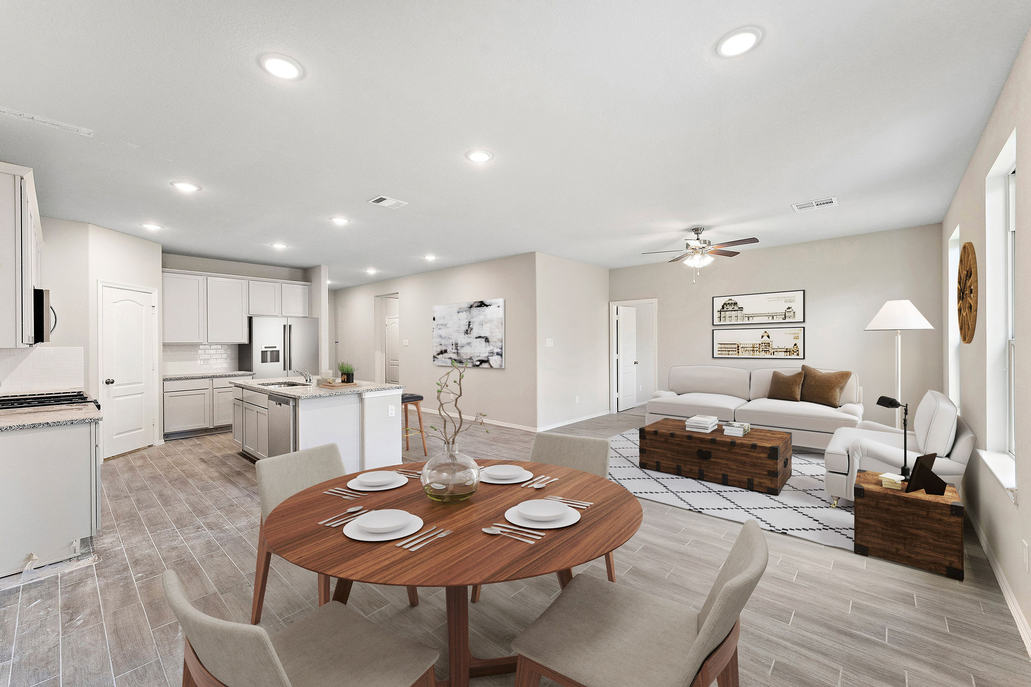 A large living room with a dining table and couches.