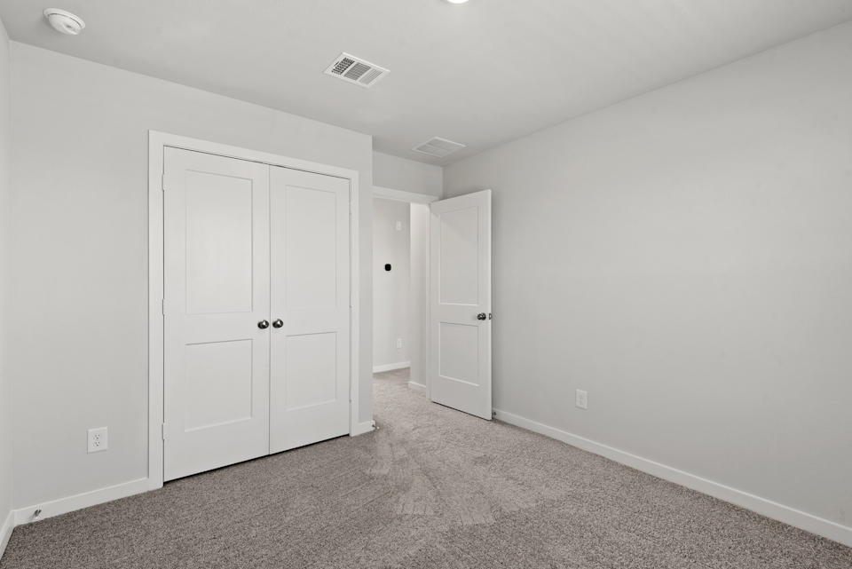 A room with white doors.