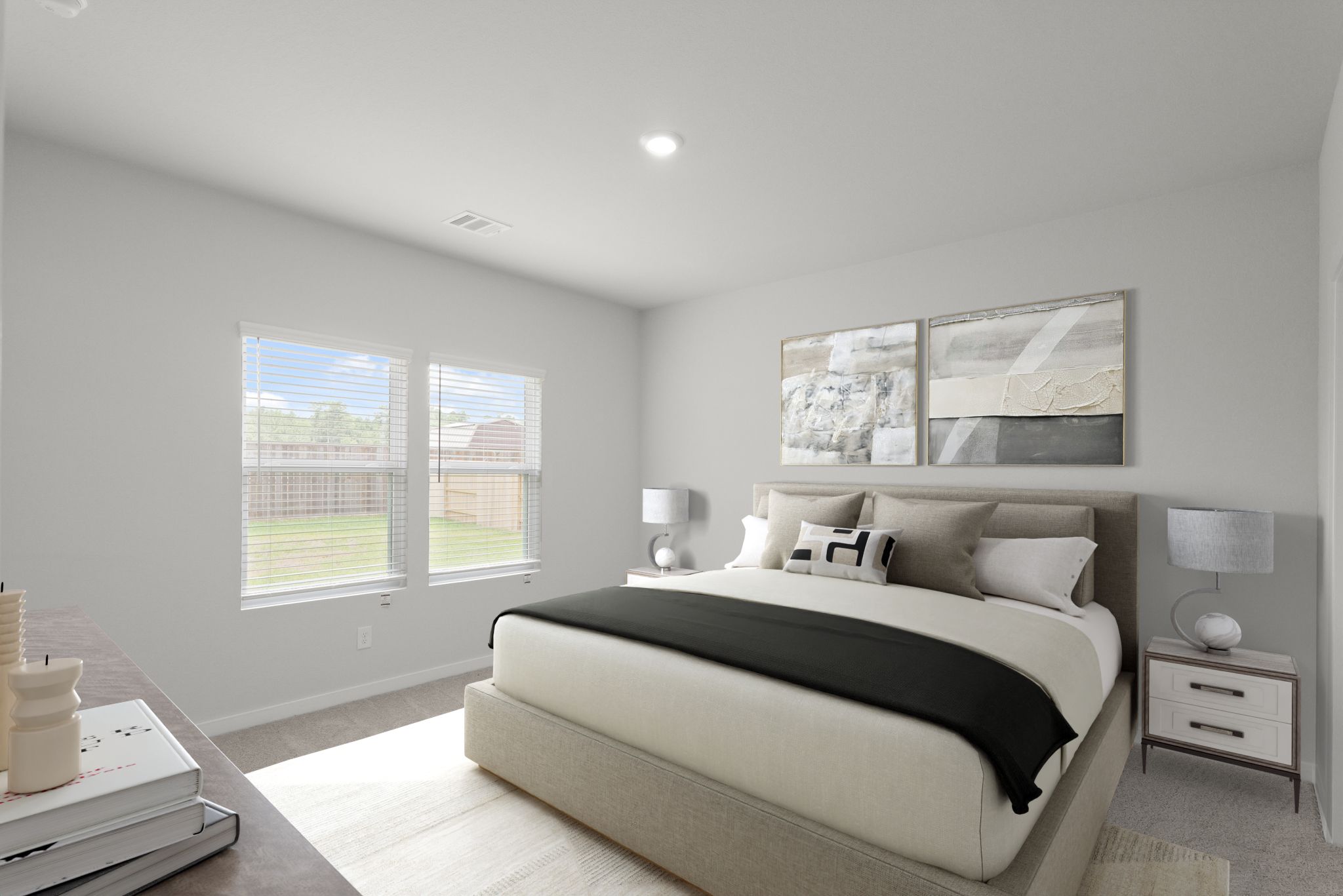 A bedroom with a large window.