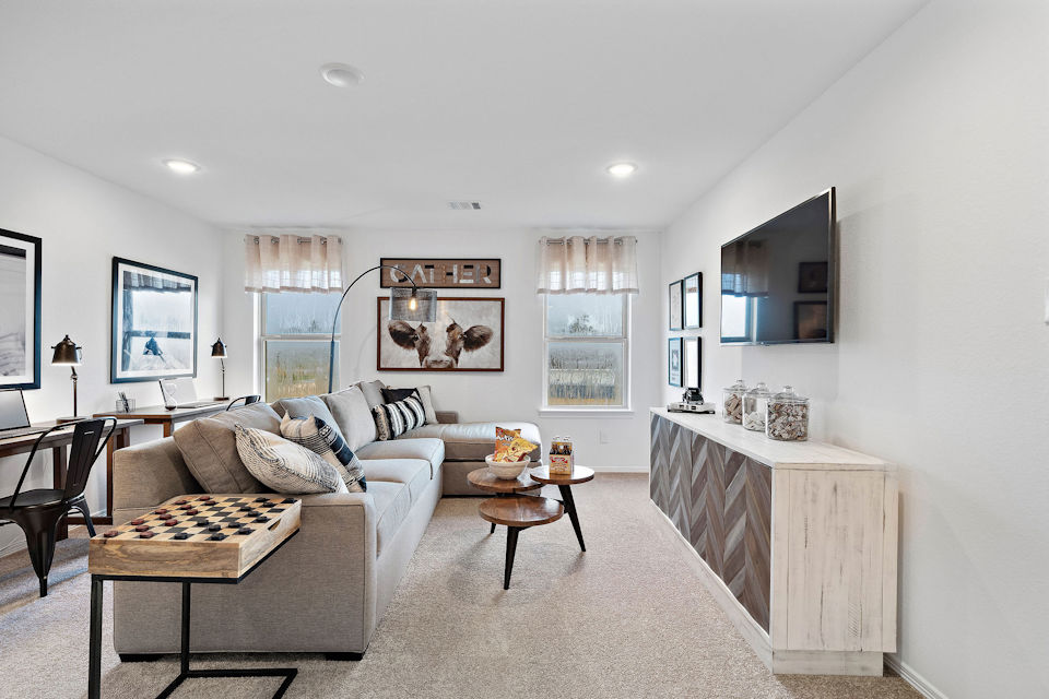 A living room with a couch and a coffee table.