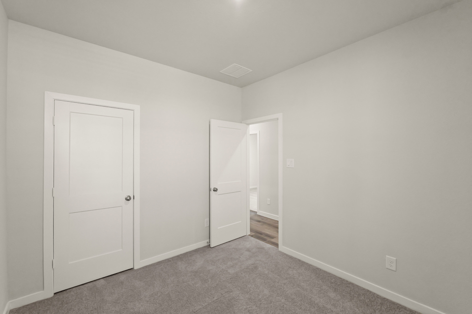 A room with white doors.