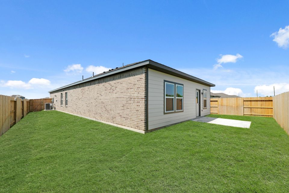 A house with a fence around it.
