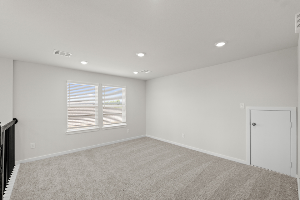 A room with a door and a window.