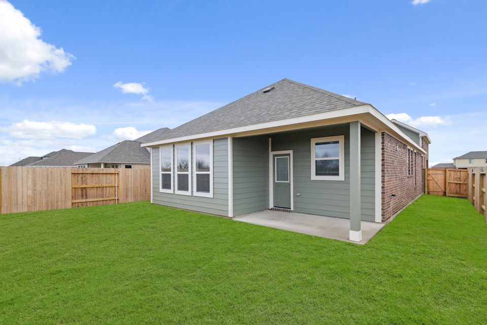 A house with a fence around it.