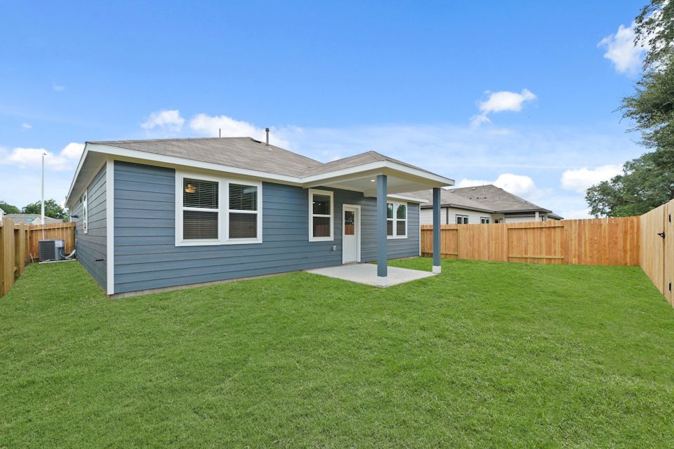A house with a fence around it.